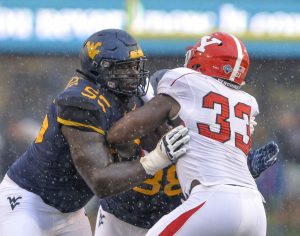All-Big 12 offensive tackle Yodny Cajuste to skip bowl game